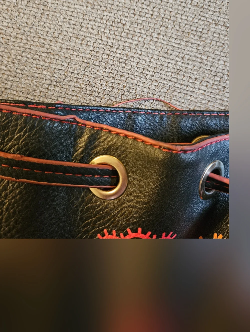 Embroidered Floral Bucket Shoulder Bag in Black and Orange